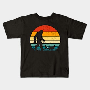 Bigfoot Walking a Raccoon Vintage Sunset Trash Panda Kids T-Shirt